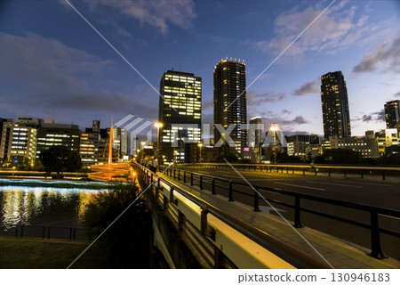 Night view of buildings from the bridge 130946183