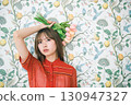 Woman with a bouquet 130947327