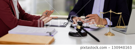 Professional Legal Consultation Expert Lawyers Advise Clients Justice Documents Office Setting Professional Legal Consultation Expert Lawyers Advise Clients Justice Documents Office Setting 130948163