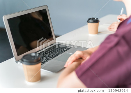 Medical conferences, study sessions, seminars, training, medical staff in scrubs receiving training 130948914