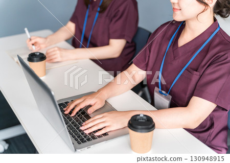 Medical conferences, study sessions, seminars, training, medical staff in scrubs receiving training 130948915