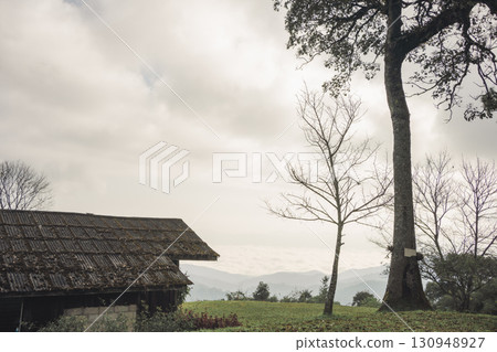 landscape and travel concept with sunrise and layer of mountain and mist with country house landscape and travel concept with sunrise and layer of mountain and mist with country house 130948927