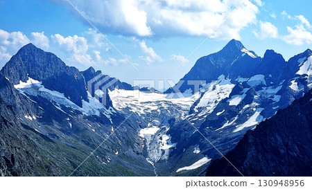 The Caucasus mountains are covered in snow. 130948956