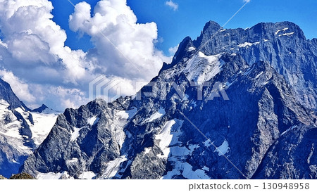 The Caucasus mountains are covered in snow. 130948958
