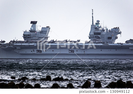 British Navy aircraft carrier HMS Prince of Wales sailing through the Uraga Strait in Tokyo Bay after arriving in Japan 130949112