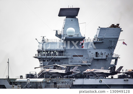 British Navy aircraft carrier HMS Prince of Wales sailing through the Uraga Strait in Tokyo Bay after arriving in Japan British Navy aircraft carrier HMS Prince of Wales sailing through the Uraga Strait in Tokyo Bay after arriving in Japan 130949128