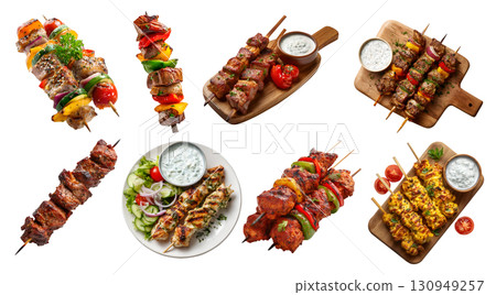 Set of Shish tikka meat vegetable grilled kebab kebob skewers, chicken lamb beef pork, serving wooden board, with sauce, plate, pile stack on transparent cutout PNG. Mockup template 130949257