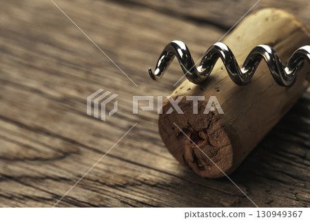 corkscrew twisted into cork corkscrew twisted into cork 130949367