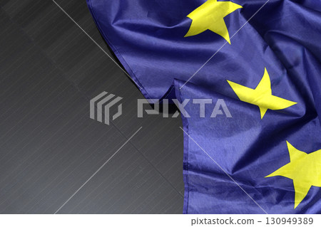 European Union flag placed on solar panel European Union flag placed on solar panel 130949389