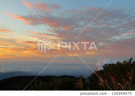 Evening view from the summit: sunset sky 130949475