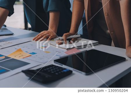 Professional Executive business team brainstorming on meeting to planning investment project working and strategy of business making conversation with partner and consultation of collaboration 130950204