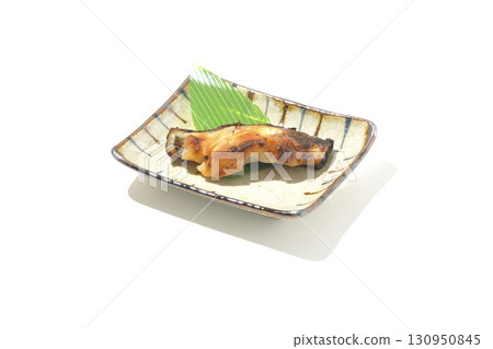 Grilled silver cod in saikyo style on a white background 130950845