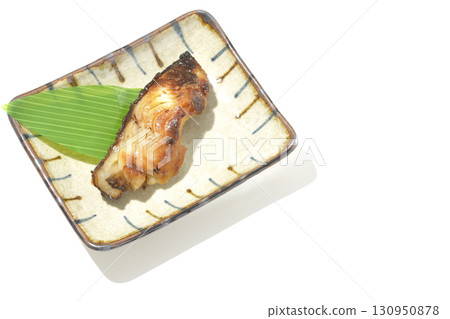 Grilled silver cod in saikyo style on a white background Grilled silver cod in saikyo style on a white background 130950878
