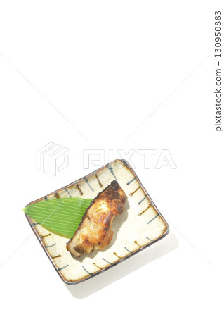 Grilled silver cod in saikyo style on a white background 130950883