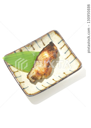 Grilled silver cod in saikyo style on a white background 130950886