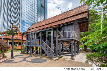 Istana Satu, historic Malay palace at Muzium Negara, Kuala Lumpur, Malaysia. Traditional architecture contrasting modern city 130950938