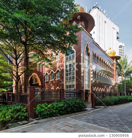 India Mosque, a prominent religious landmark with distinctive architecture in Kuala Lumpur, Malaysia, amidst an urban setting 130950956