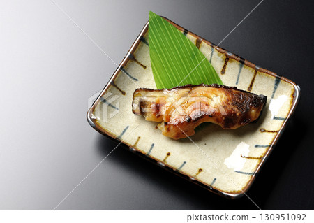 Grilled silver cod in Kyoto style on a black background 130951092