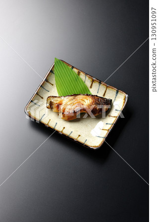 Grilled silver cod in Kyoto style on a black background 130951097