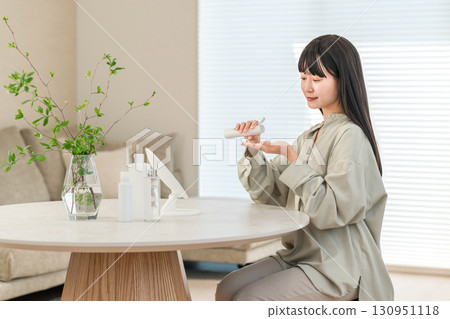 Woman skincare to moisturize skin 130951118