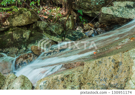 Mountain stream flowing over rocks downstream of Youbai Falls, Shiga Prefecture 130951174