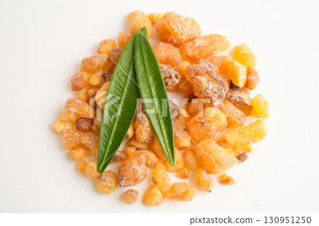 Frankincense or olibanum aromatic resin isolated on white background used in incense and perfumes. Frankincense or olibanum aromatic resin isolated on white background used in incense and perfumes. 130951250