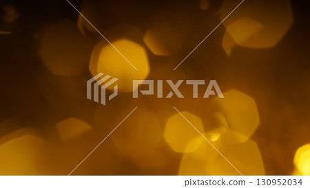 Golden garland lights glowing softly with Christmas festive bokeh background 130952034