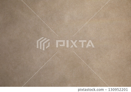 Brown grunge paper with white stains 130952201