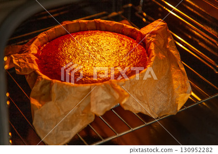 Cooking process homemade Basque burnt cheesecake. Ready toasted cheesecake is in the oven. Recipe step by step Cooking process homemade Basque burnt cheesecake. Ready toasted cheesecake is in the oven. Recipe step by step 130952282