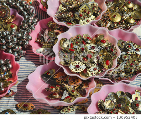 National women's jewelry made of silver and tin with semi-precious stones. Turkmenistan. Ashkhabad market. 130952403