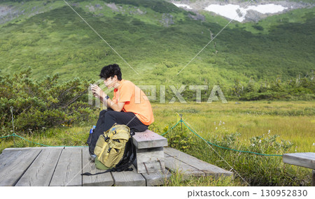 man enjoying climbing man enjoying climbing 130952830