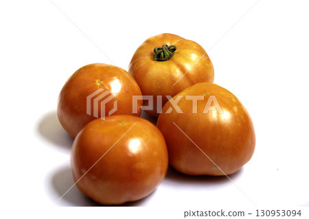 Very large bicolor striped tomato 'Lycopersicon esculentum' "Northern Lights". Very large bicolor striped tomato 'Lycopersicon esculentum' "Northern Lights". 130953094