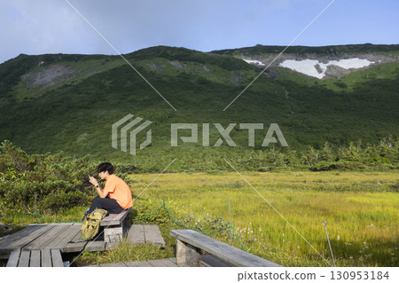 man enjoying climbing 130953184