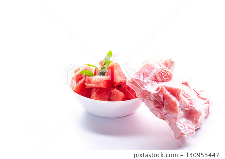 juicy red watermelon in a vacuum for storage juicy red watermelon in a vacuum for storage 130953447