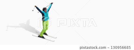 Excited female skier celebrating victory with raised arms isolated on white. Banner Excited female skier celebrating victory with raised arms isolated on white. Banner 130956685