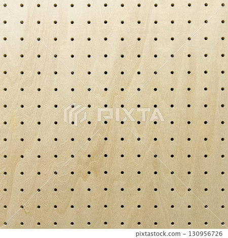 Background image of square perforated board with wood grain Background image of square perforated board with wood grain 130956726