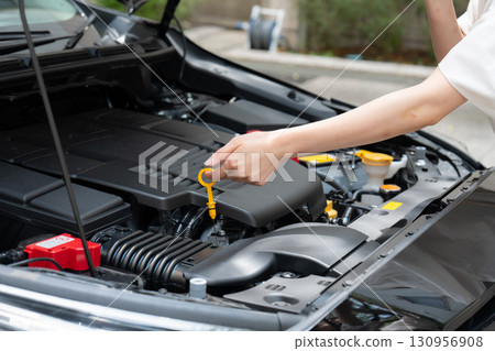 Car engine room hand Car engine room hand 130956908