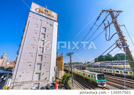 Tokyo cityscape in Japan. Hotel district in front of Uguisudani Station. Overlooking Hotel Charme Uguisudani II. (P24H full)... = 17th 130957081
