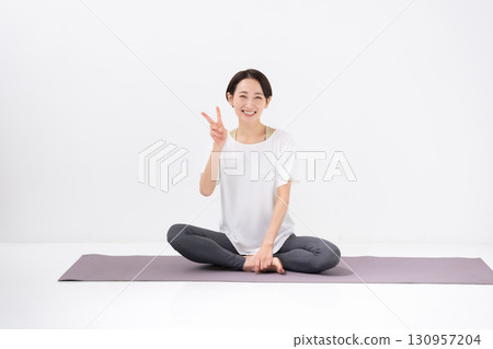 Woman doing yoga Peace 130957204