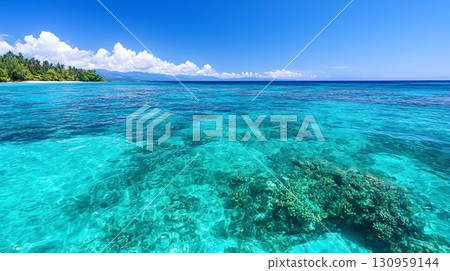 Landscape background Crystal clear ocean waters reveal vibrant coral reefs beneath surface, lush greenery and bright blue sky. This serene tropical paradise invites relaxation and exploration 130959144