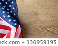 Background for Memorial Day posters, Veterans Day banners, and patriotic holiday designs. American flag on wooden background with copy space. 130959195