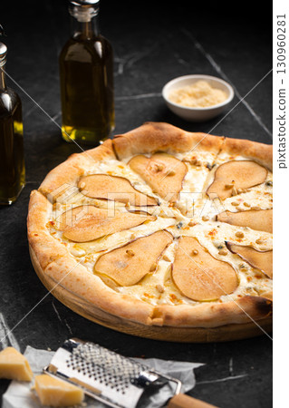 Gourmet pear and cheese pizza with crispy crust Gourmet pear and cheese pizza with crispy crust 130960281