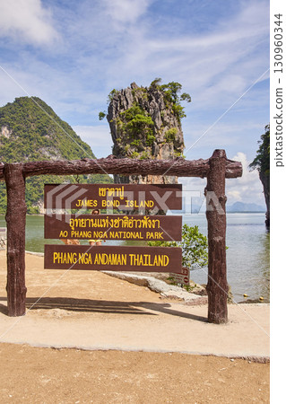 James bond island sign in ao phang nga national park thailand with scenic ocean James bond island sign in ao phang nga national park thailand with scenic ocean 130960344