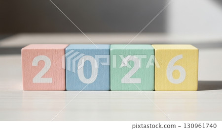 Colorful Wooden Blocks Displaying the Year 2026 on a Bright Surface Colorful Wooden Blocks Displaying the Year 2026 on a Bright Surface 130961740