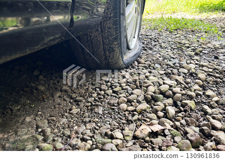 completely flat tire on a car, road breakdown, accident completely flat tire on a car, road breakdown, accident 130961836