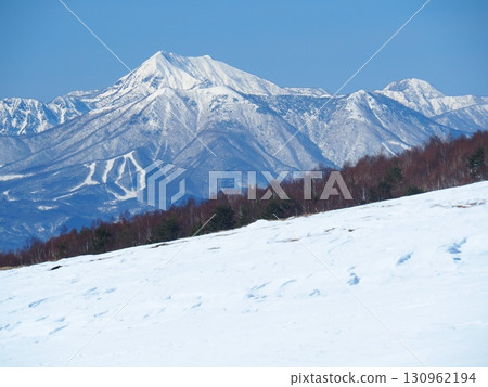 Mount Takatsuma in winter as seen from Mount Azumaya 130962194