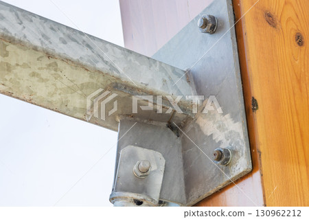 Heavy Duty Galvanized Steel Bracket Bolted to Timber Post Heavy Duty Galvanized Steel Bracket Bolted to Timber Post 130962212