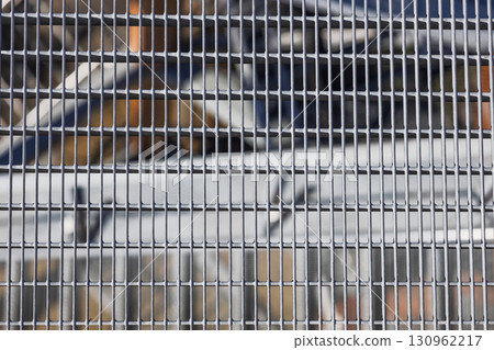 Stainless steel security fence with vertical bars and tension bracing 130962217