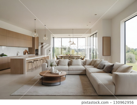 Modern interior design features a luxurious open-plan living room with kitchen, furniture, wooden floors, and large windows. 130962956