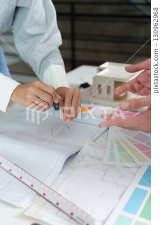 Interior Design Consultation: Using Compass and Color Samples on Plans Interior Design Consultation: Using Compass and Color Samples on Plans 130962968